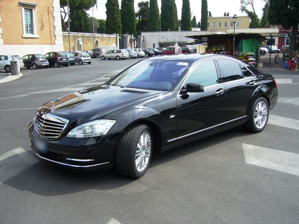 Typical car: Mercedes sedan or similar